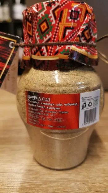 Sharena Sol/Buntes Salz handgemacht 140g mit Zutatenliste auf Bulgarisch, traditionell verpackt mit folkloristischem Stoffdeckel.